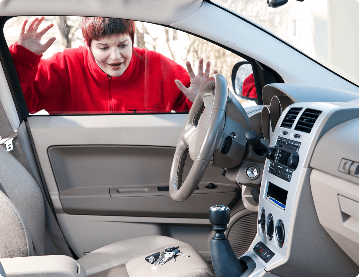Person locked out of car, keys inside.