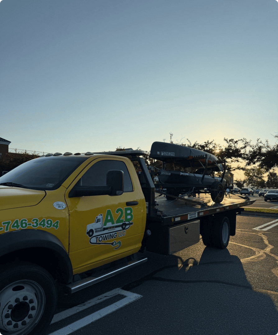 Tow truck carrying a small aircraft fuselage.